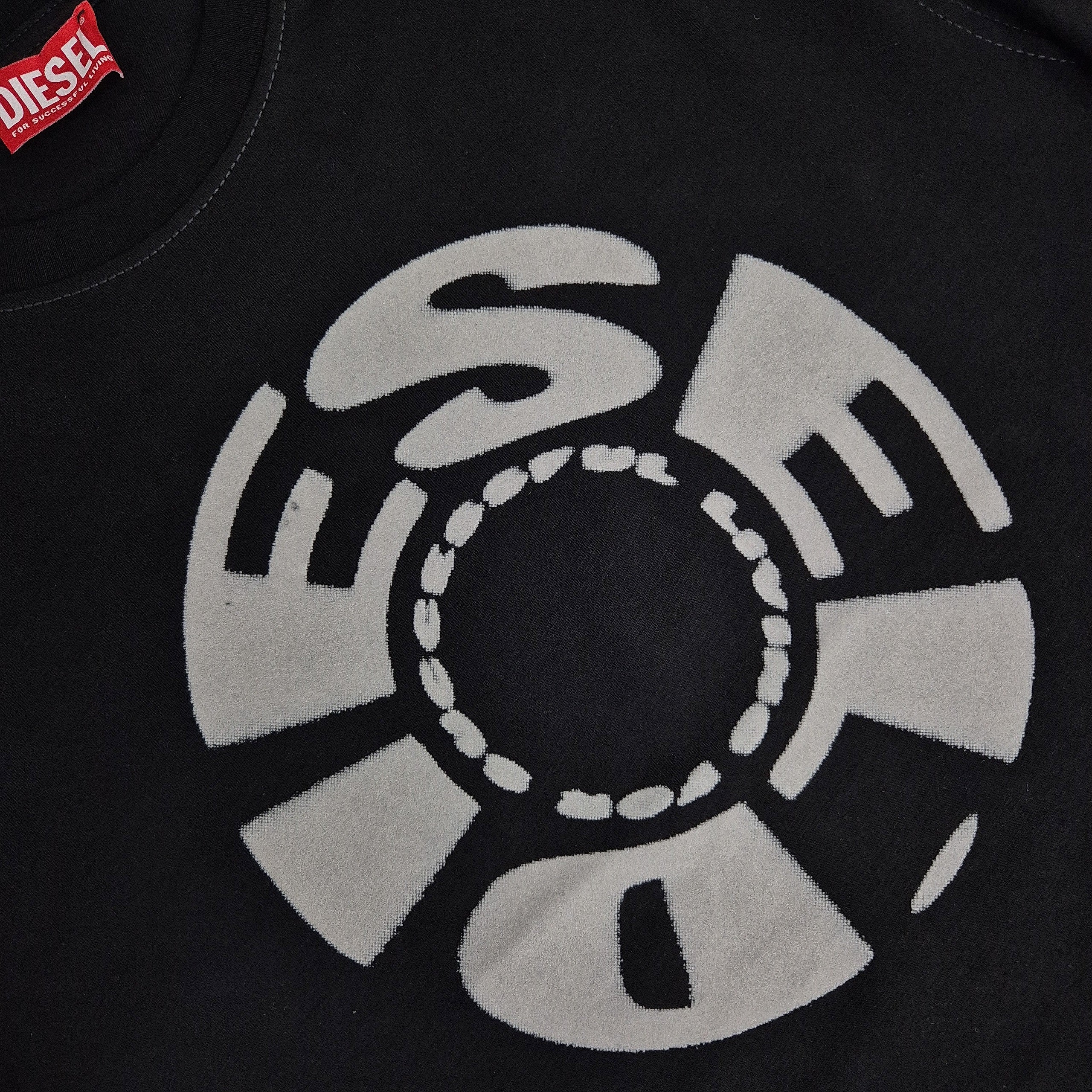 Black t-shirt with a white logo and Diesel brand label.